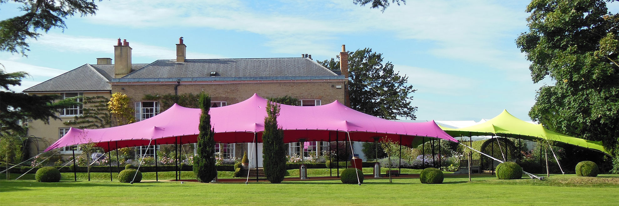 Pink stretch tent and green stretch tent
